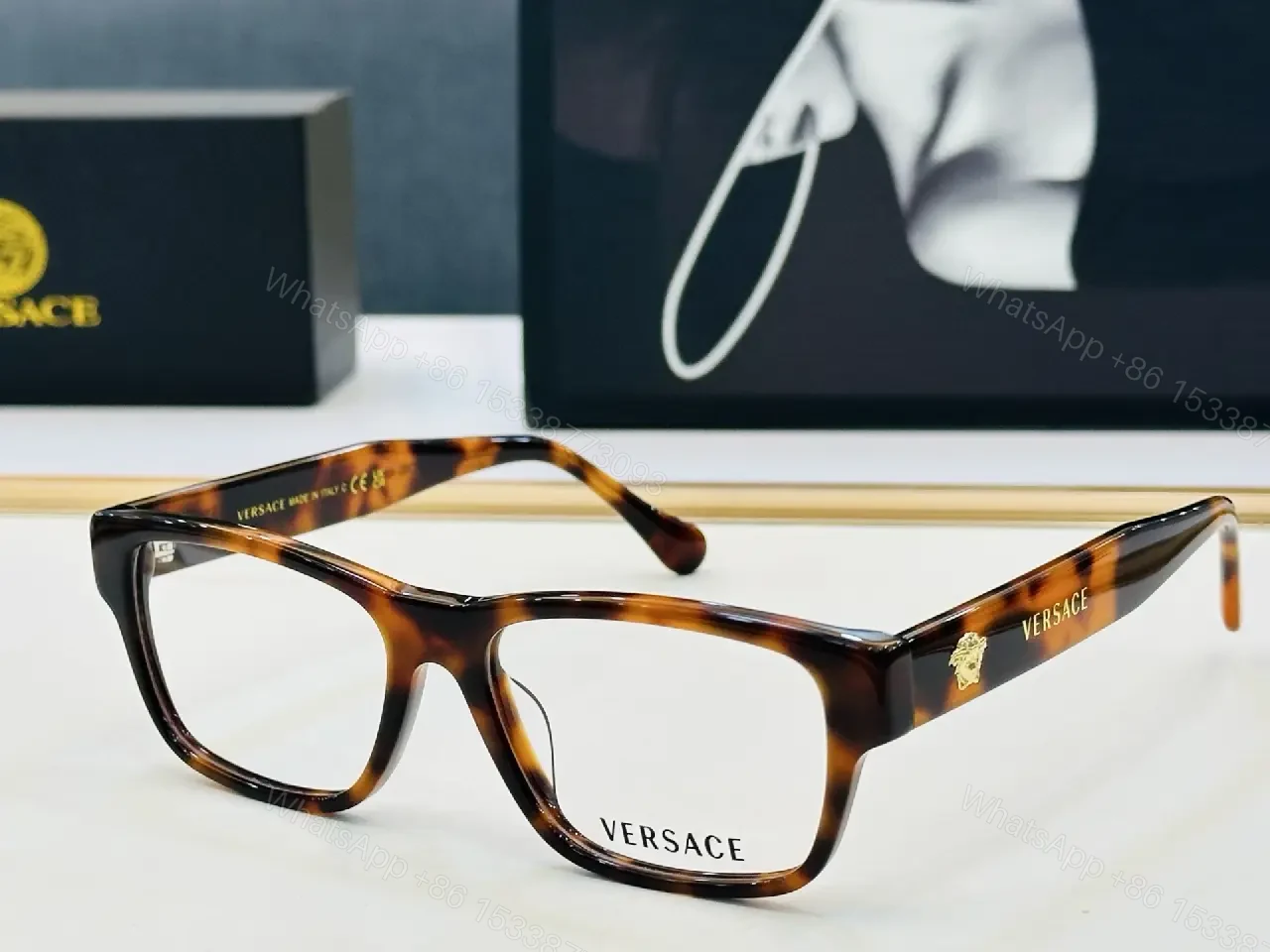 View 10 of Bold Black Acetate Square Glasses with Gold Logo Emblems