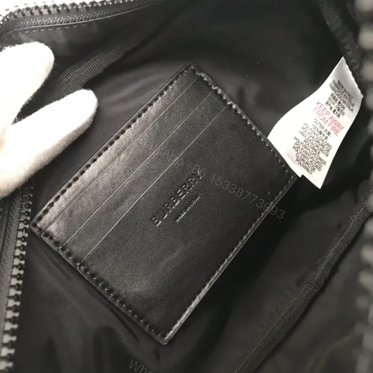 View 5 of Burberry Embossed Leather Crossbody - Luxe Everyday Utility