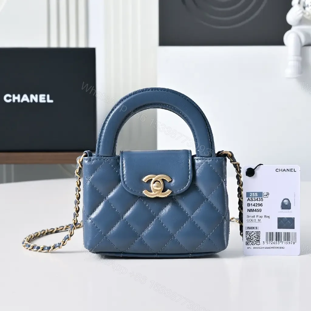 View 4 of Compact Blue Quilted Satchel with Gold Clasp Bag