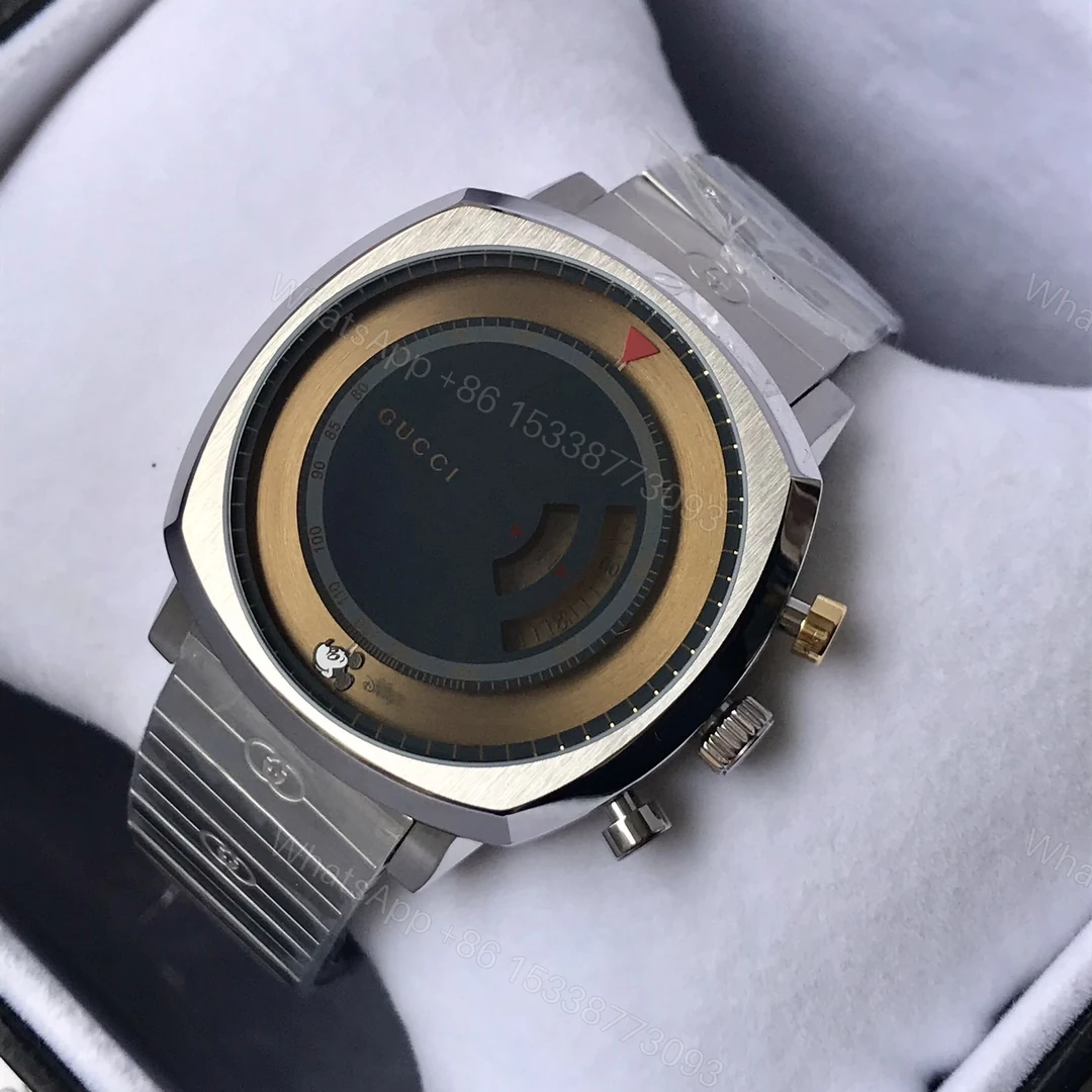 Gucci Grip 黑金雙色表盤精鋼腕錶 個性跳時款 — view 1