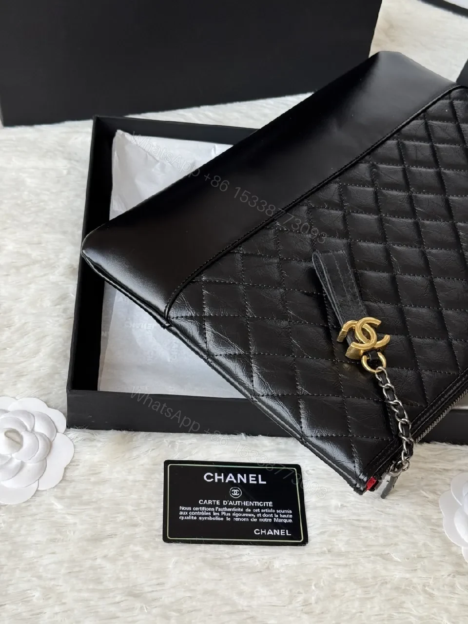 View 3 of Quilted Leather Wristlet: Modern Luxury, Compact Chic