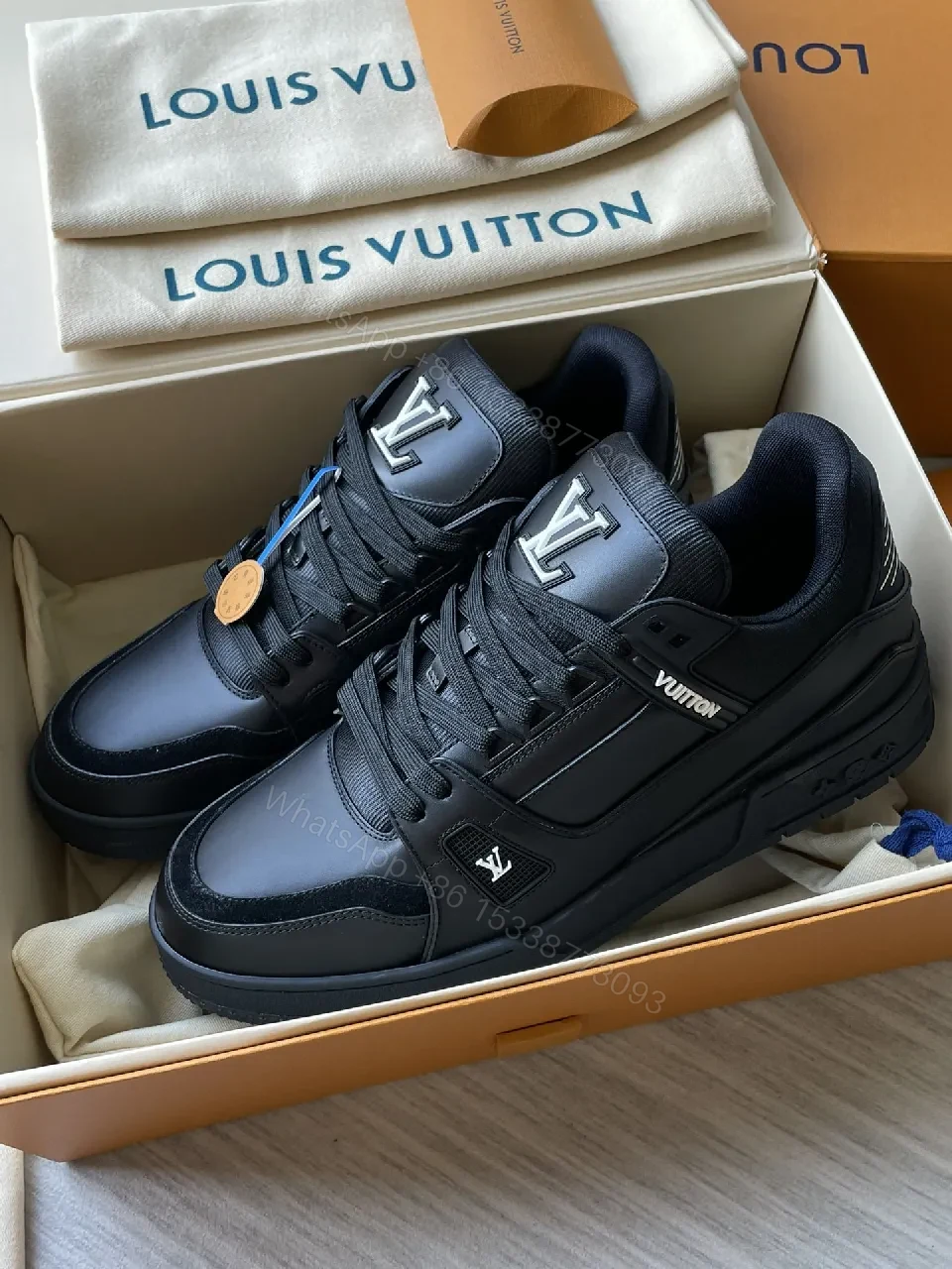 View 3 of Black Leather High‐Top Sneakers with LV Embellishments