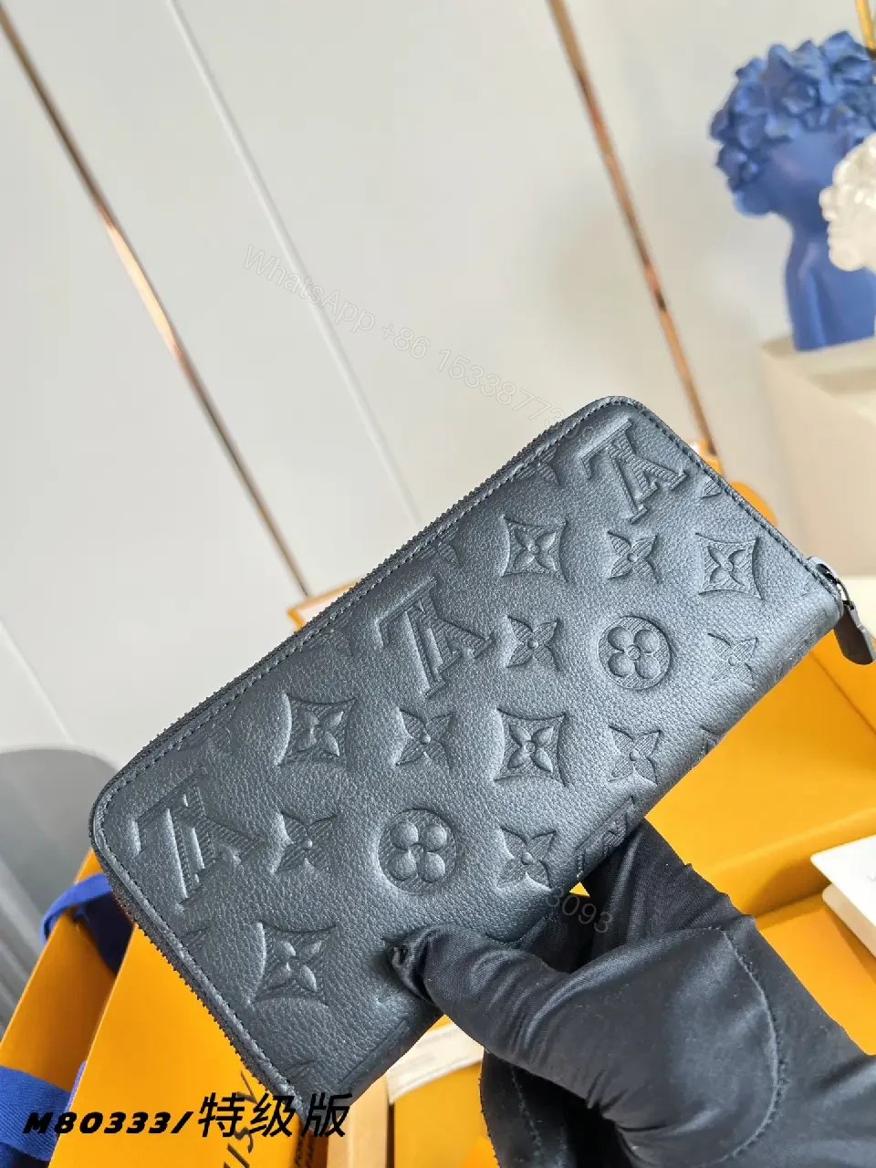 View 5 of Navy Leather Zip Continental Wallet with LV Embossed Monogram