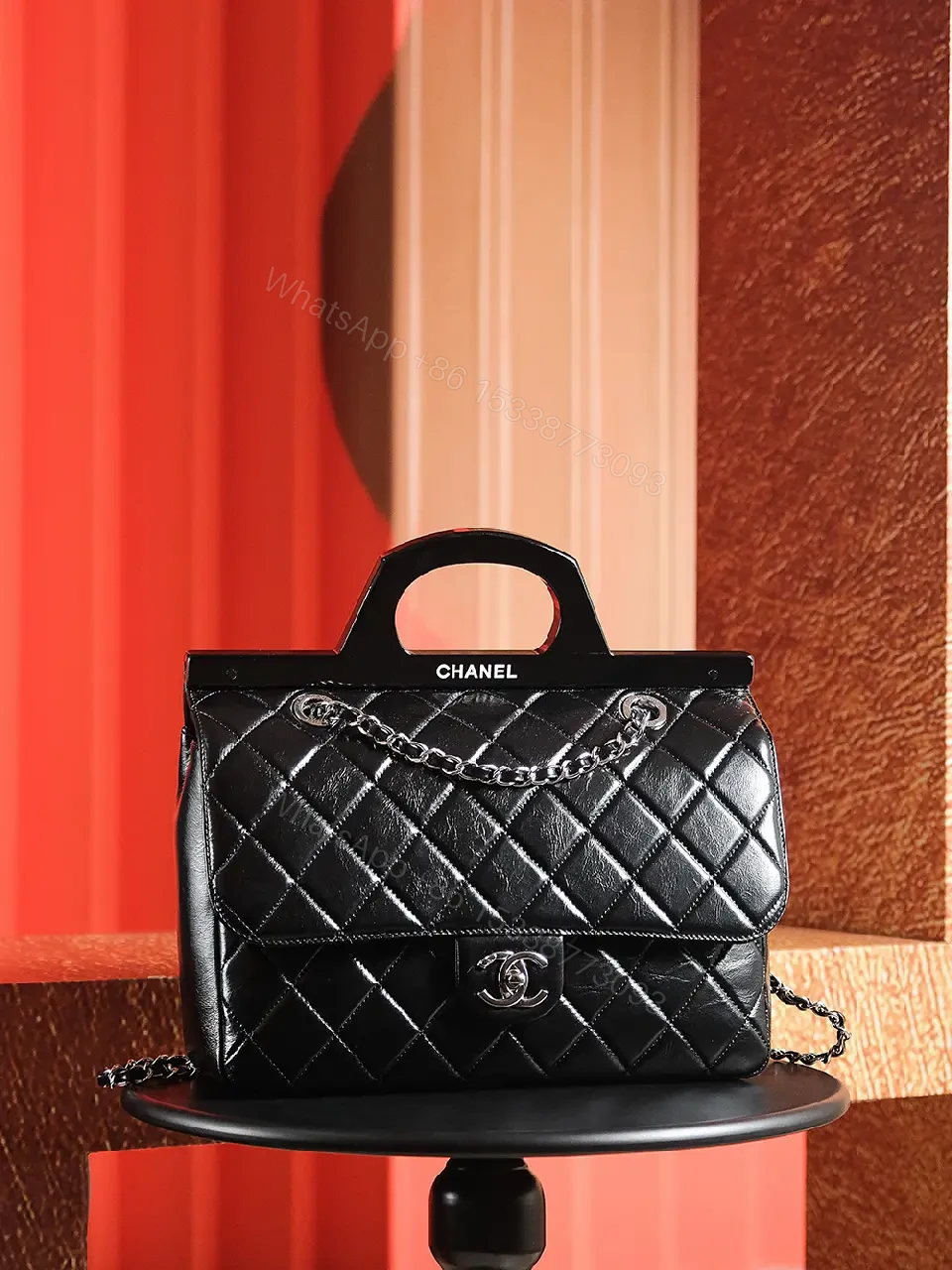 View 4 of Black Quilted Leather Handbag - Classic Chic, Compact Luxury