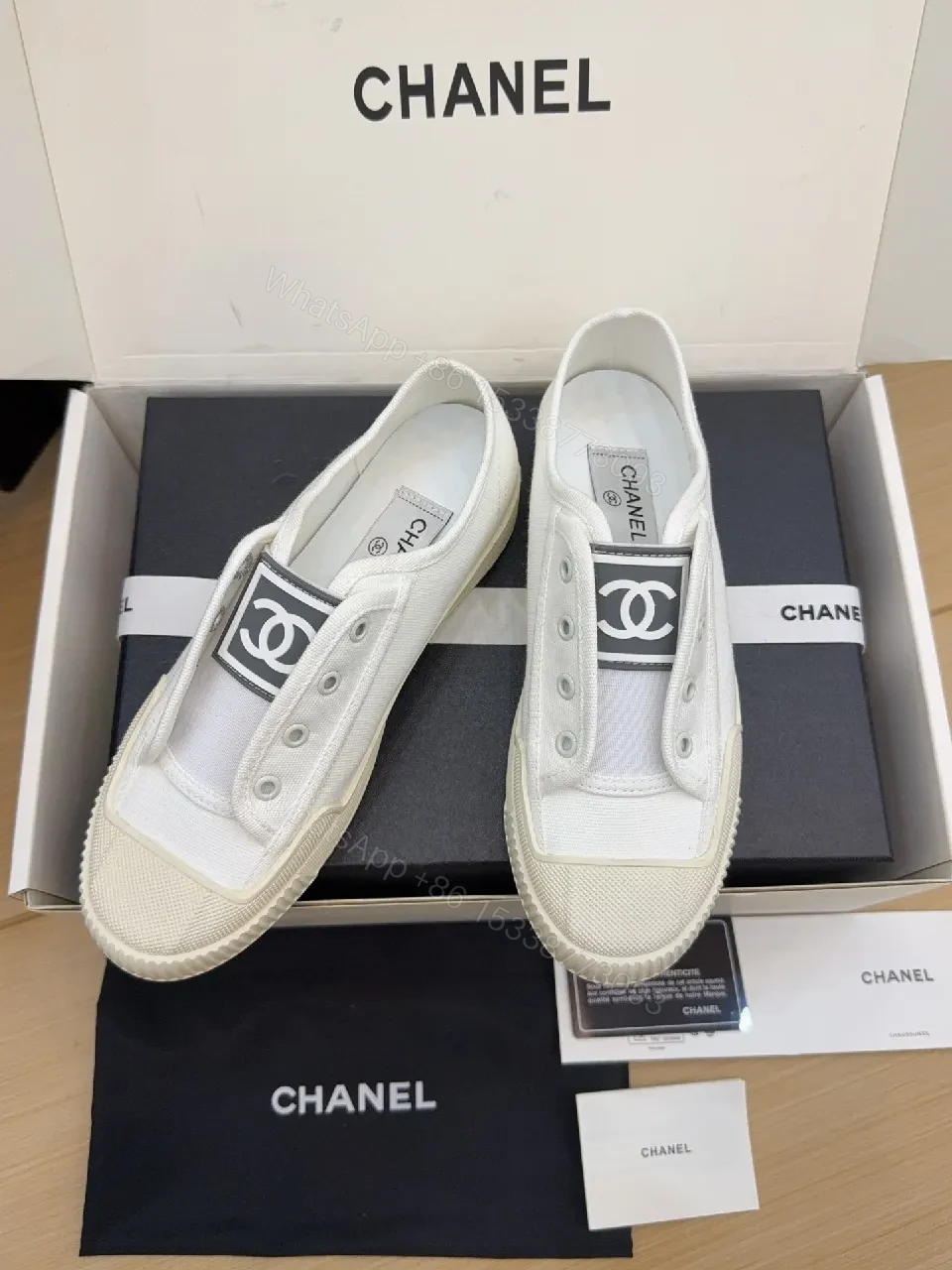 Refined Canvas Sneaker: Luxe Logo-Front High-Top Comfort — view 1