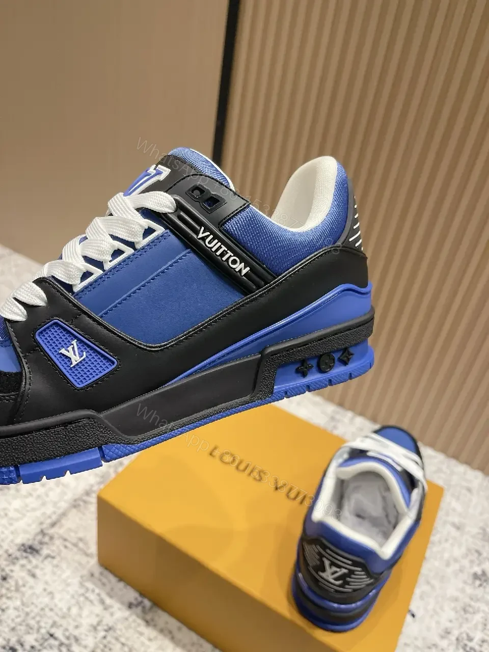 View 3 of Textured Blue-Black Leather High-Tops with Bold Detailing