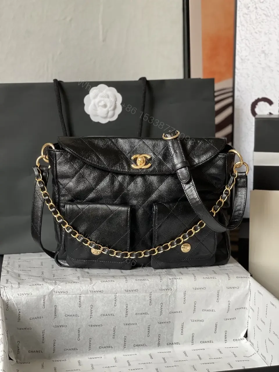 View 3 of Quilted Black Leather Satchel with Gold Chain Accent