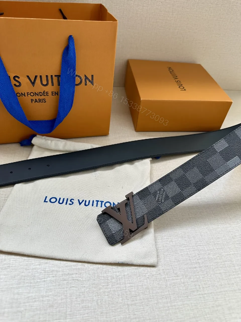 View 4 of Checkerboard Leather Belt with Gunmetal Buckle, Unisex Style
