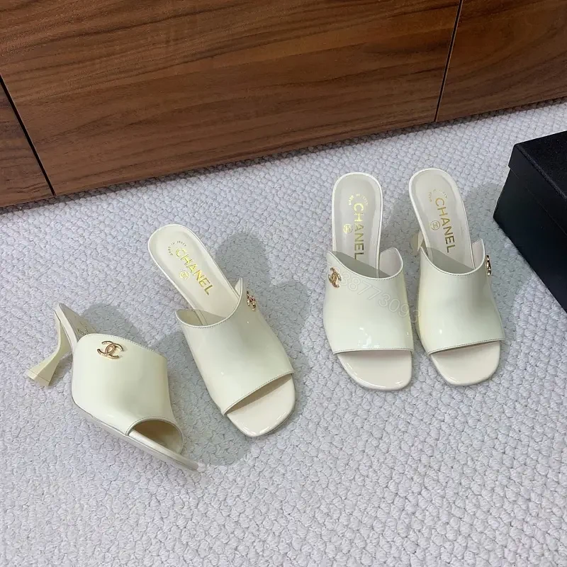 Cream Leather Slide Sandals, Pearl White, Chanel Logo, Midsize Heel Mules — view 1
