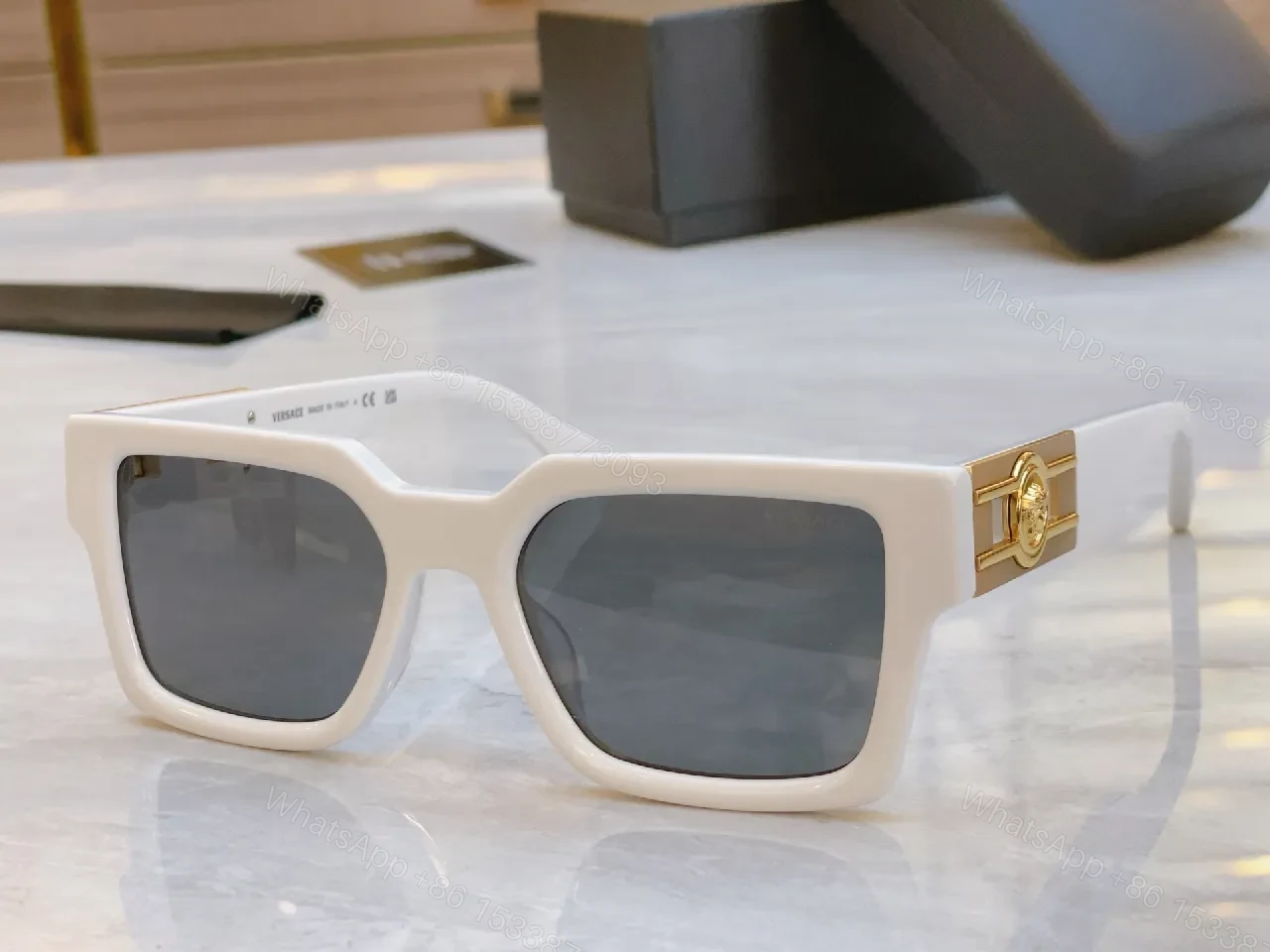 View 8 of Deep Tone Frame Luxe Sunglasses with Signature Hardware