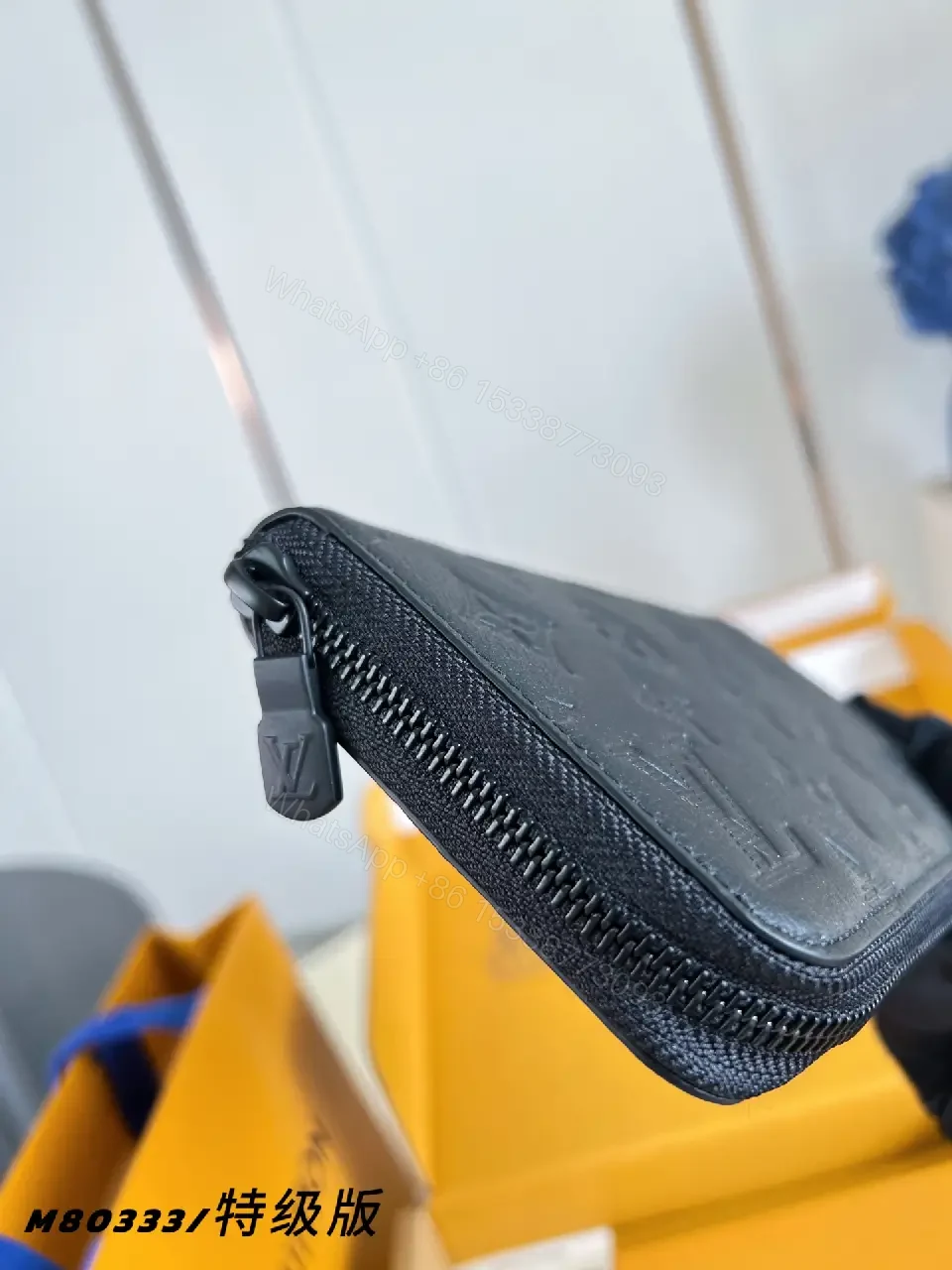 View 2 of Navy Leather Zip Continental Wallet with LV Embossed Monogram