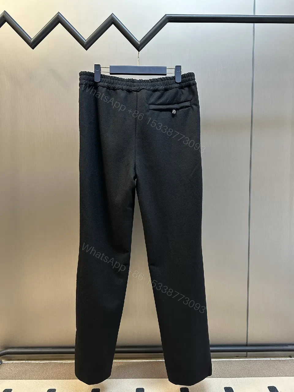 View 7 of Minimalist Tailored Trousers: Subtle LV Monogram Detail