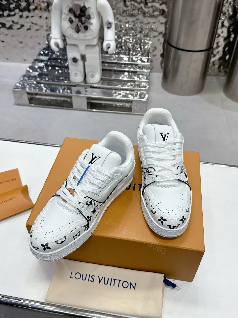 White Leather Sneaker, Monogram Motif, Luxe Street Style, Designer Flair, Sneaker — view 1
