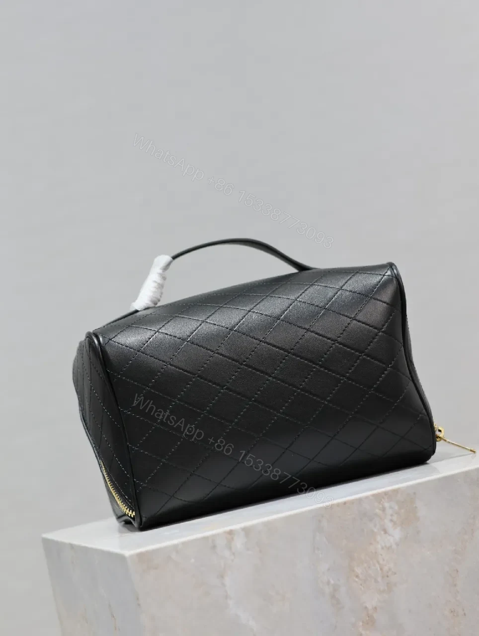 View 7 of Compact Black Quilted Leather Vanity Bag with Gold Monogram