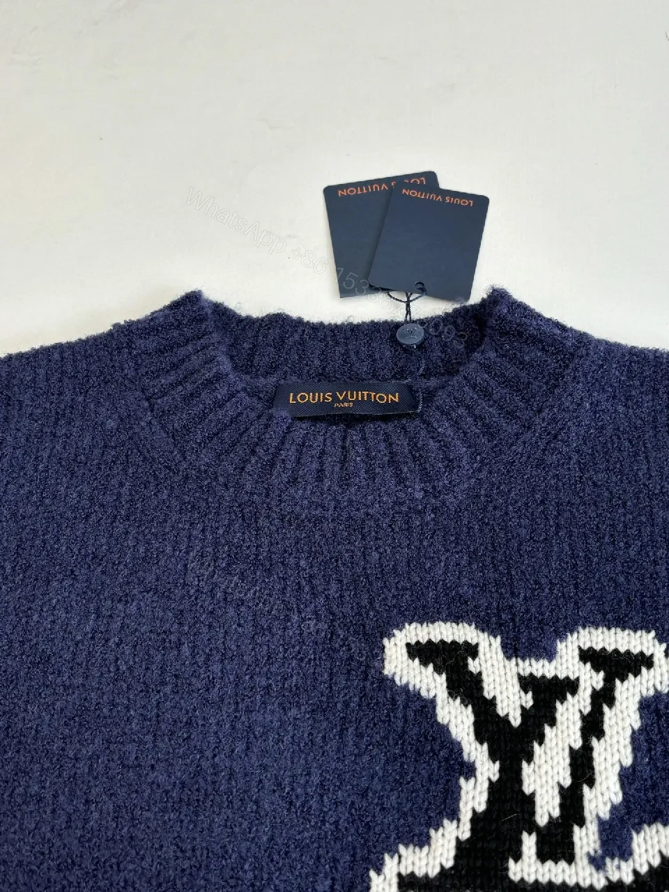 View 6 of Blue Knit Luxury Sweater with Signature Monogram Emblem