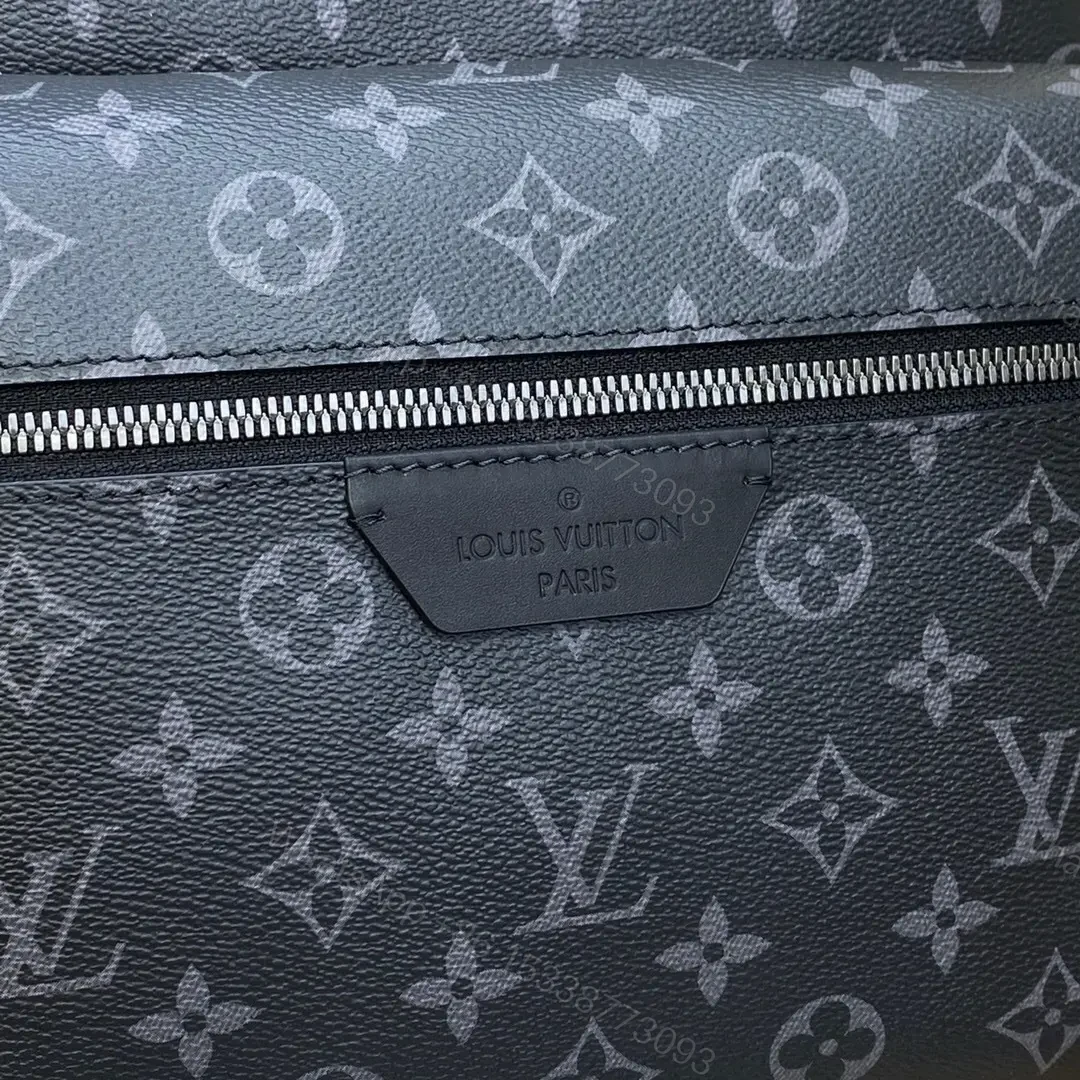 View 3 of Louis Vuitton Discovery Backpack in Monogram Eclipse canvas