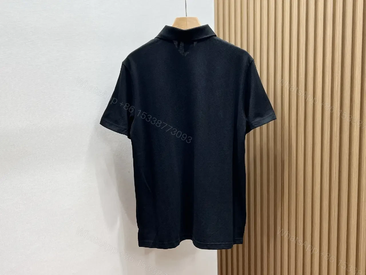 View 11 of Minimalist White Cotton Polo with Subtle Detailing