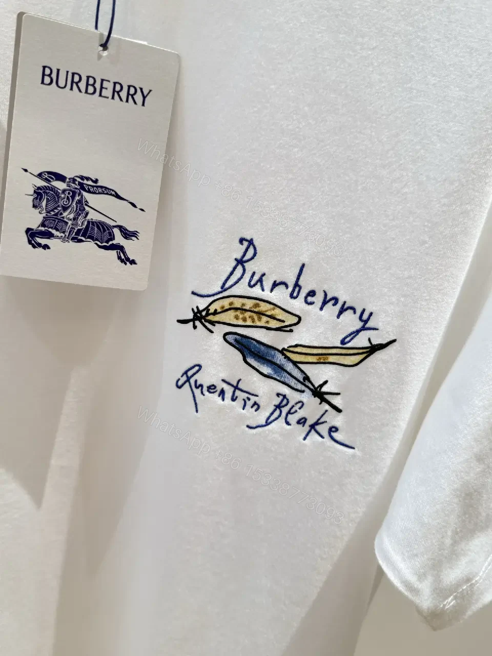 View 11 of White Cotton Oversized T-Shirt with Burberry Graphic Front