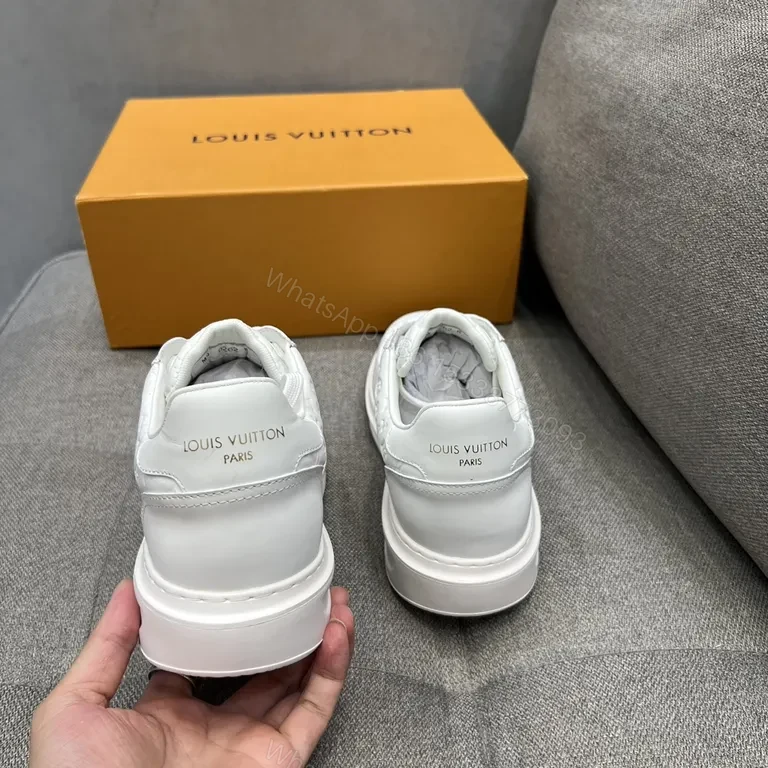 View 3 of White Leather Sneakers with Gold LV Accent, Luxe Everyday