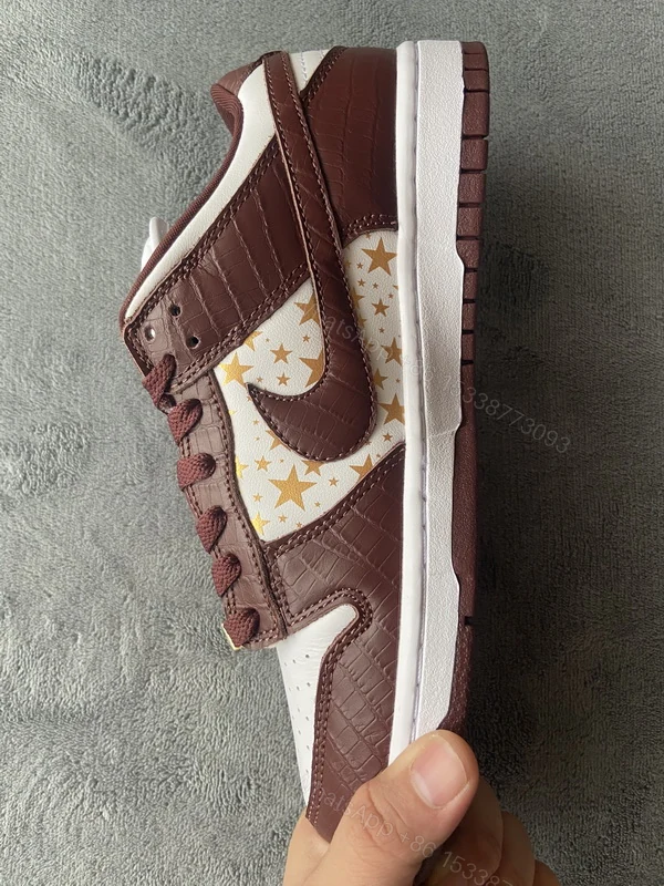 View 3 of Supreme x Nike SB Dunk Low "Brown Stars” DH3228-103