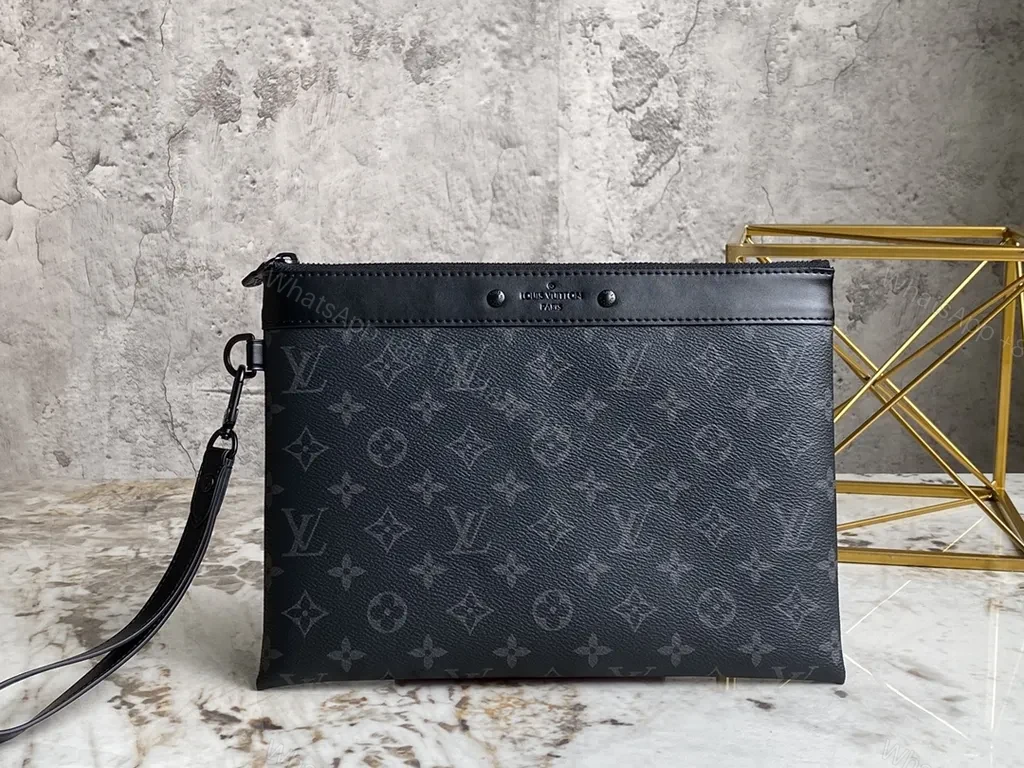 Dark Monogram Clutch: Luxe Black Canvas, Leather Trim, Wrist Strap — view 1