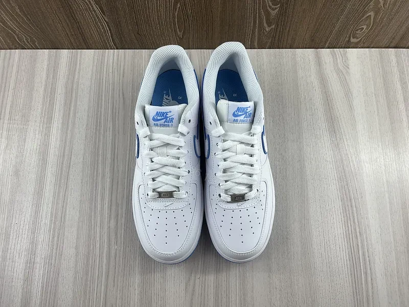 View 2 of White & Blue Minimalist Leather Sneaker â€“ Low-Top Comfort