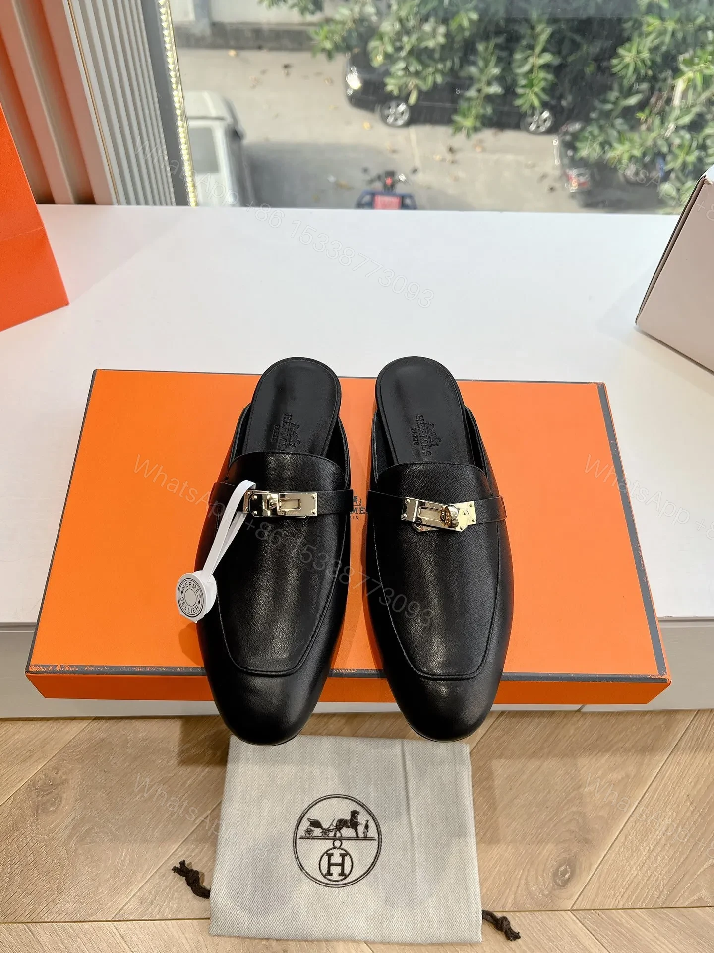 Hermes Women Black Leather Mules — view 1