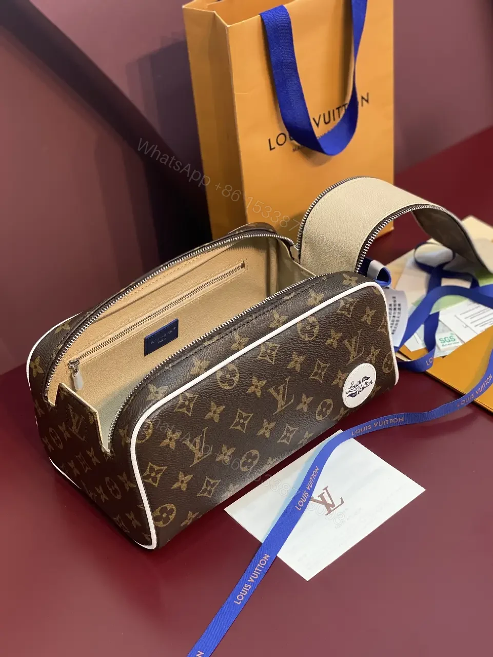 View 4 of Blue Leather Trim Toiletry Bag: Monogram Canvas, LV Zippers, Adjustable Strap