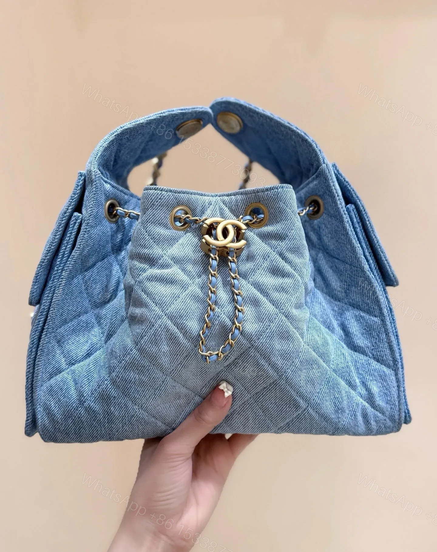 View 5 of CHANEL 25 SMALL IN BLUE 30 DENIM GOLD HARDWARE