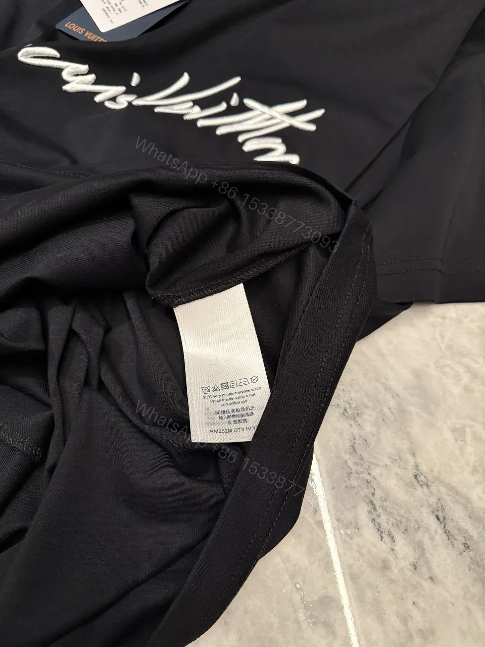 View 9 of Black Cotton Tee with Signature Brushstroke Logo, Modern Fit, Premium Comfort