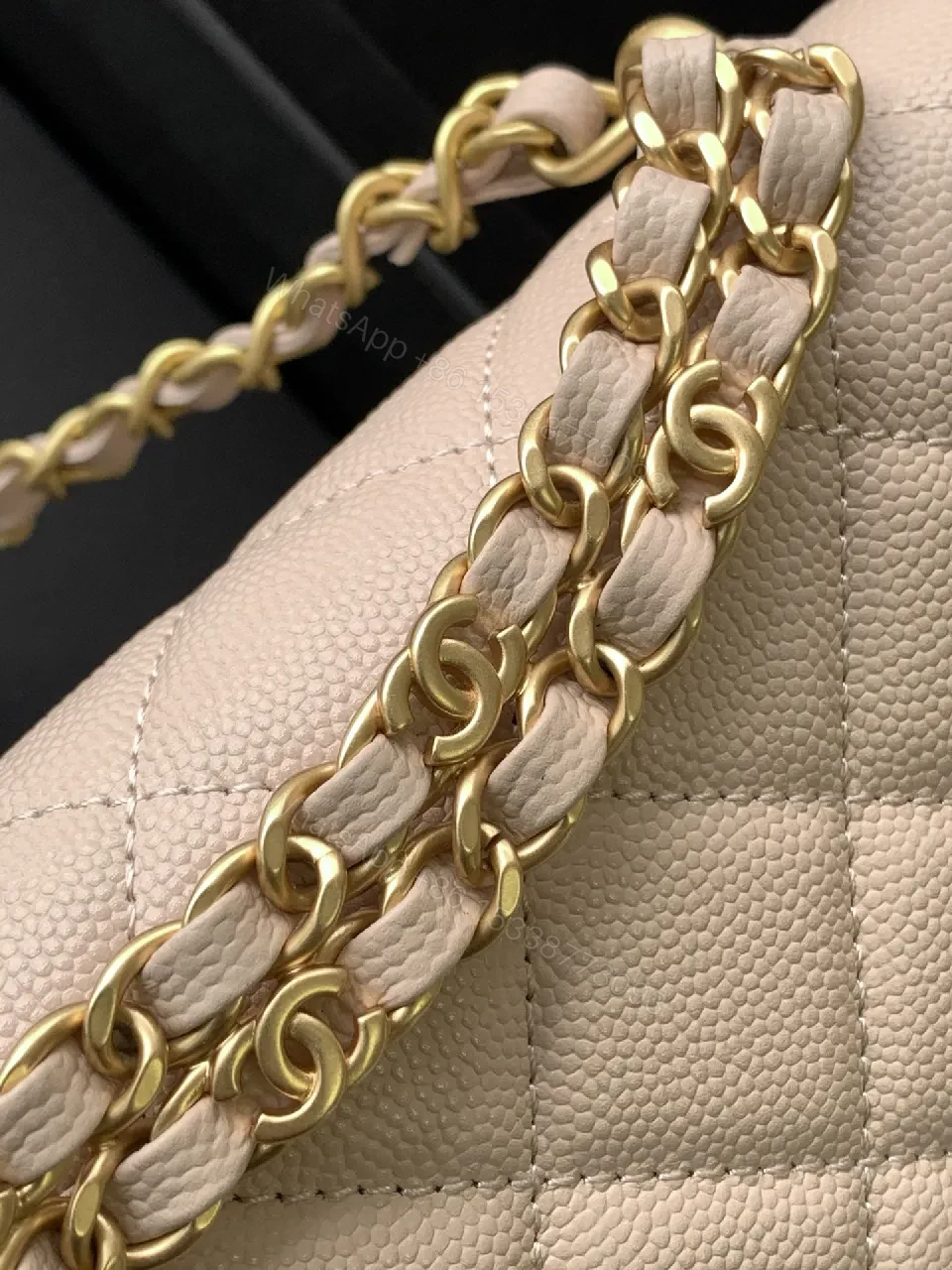 View 9 of Soft Beige Quilted Bag with Luxe Chain – Compact Luxury Tote