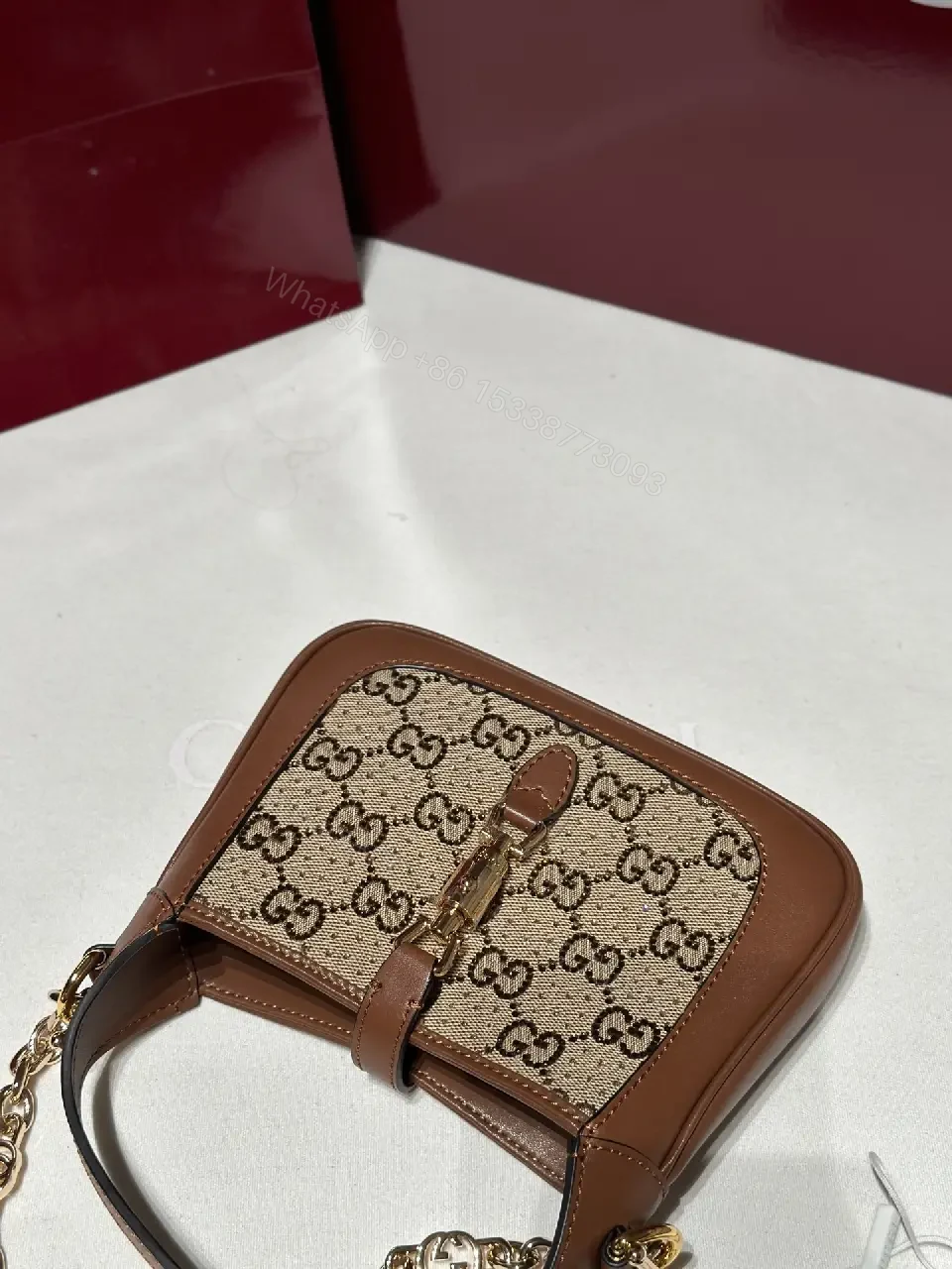 View 2 of Beige GG Supreme Satchel: Mini Structured Elegance, Gold Hardware