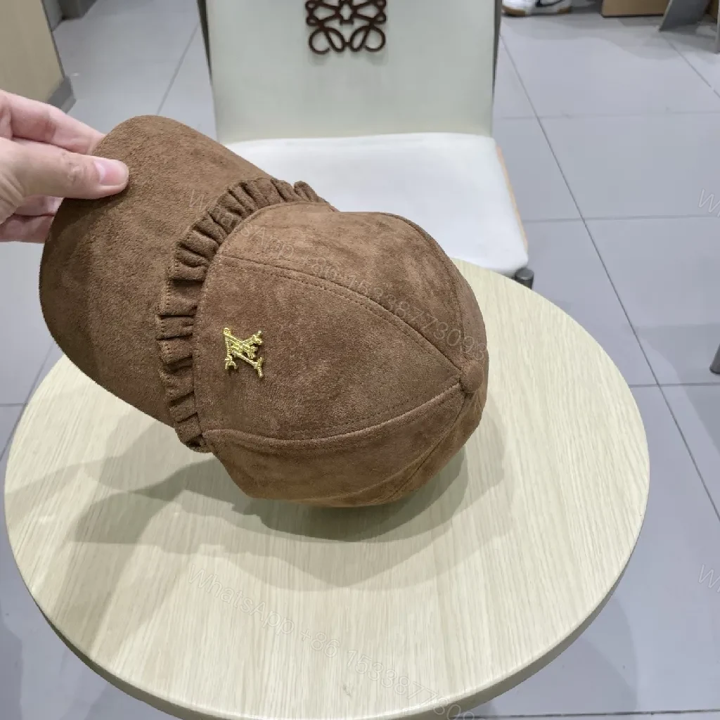 View 5 of Brown Suede Cap with Gold Emblem - Textured Luxury Cap