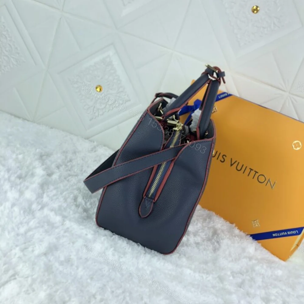 View 4 of Louis Vuitton Montaigne MM Monogram Empreinte Navy Blue 33Cm M42746