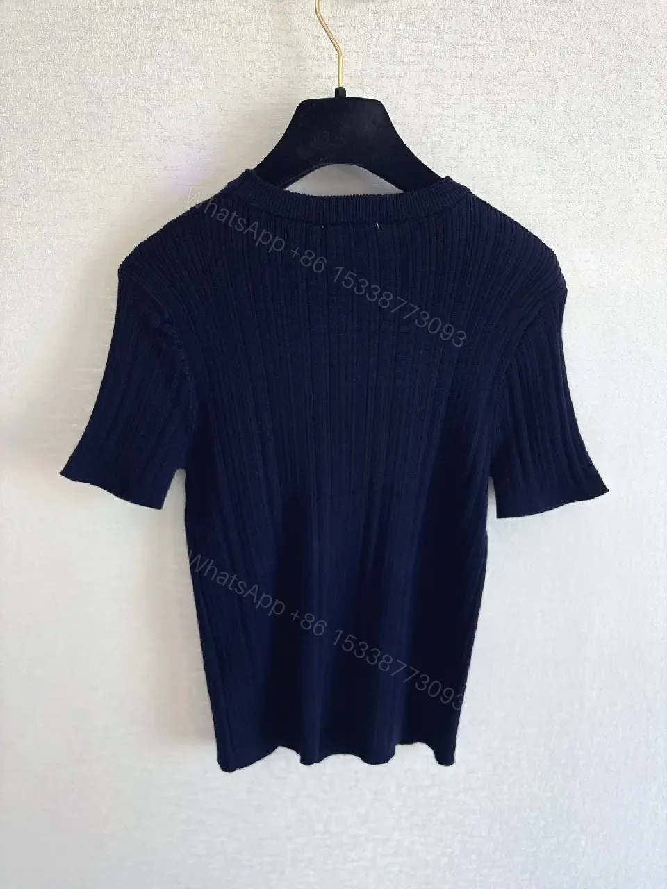 View 7 of Navy Knit Tee: Ribbed Texture, Subtle Crest Emblem, Luxe Casual