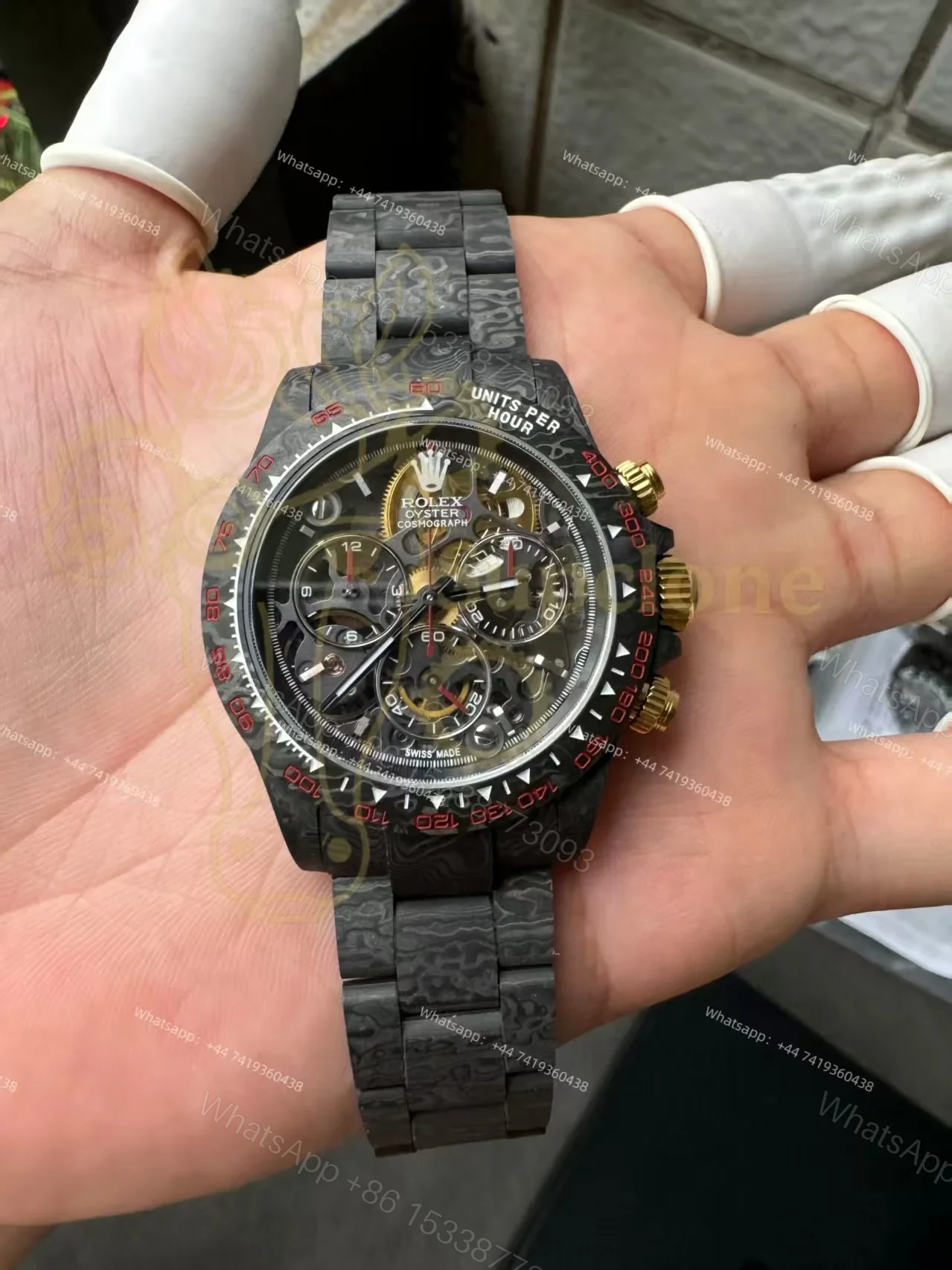Rolex Super Clone Carbon Fiber Daytona Skeleton Red Accents Gold Pushers — view 1
