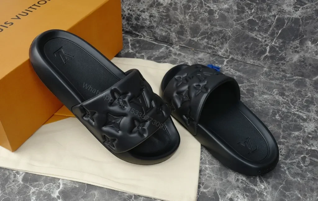 View 2 of Chic LV-Textured Leather Sandals with Monogram Strap