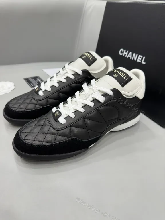 View 5 of Chanel-Quilted Leather High-Top Sneakers with Signature Details