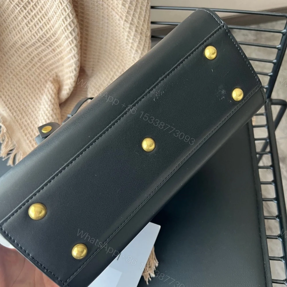 View 6 of Saint Laurent Sac De Jour Baby In Grained Black 32Cm 717448DTI0W1000