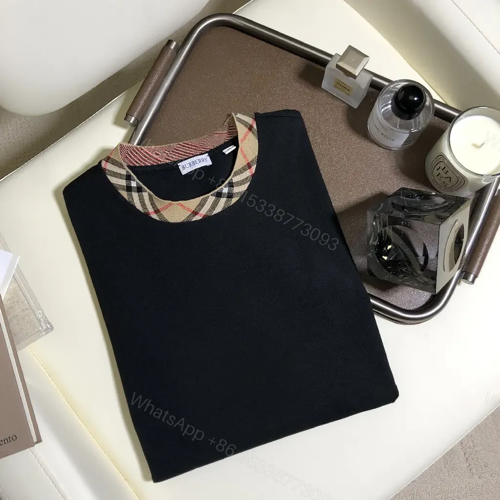 View 3 of Solid Black Short-Sleeve Tunic with Plaid Collar