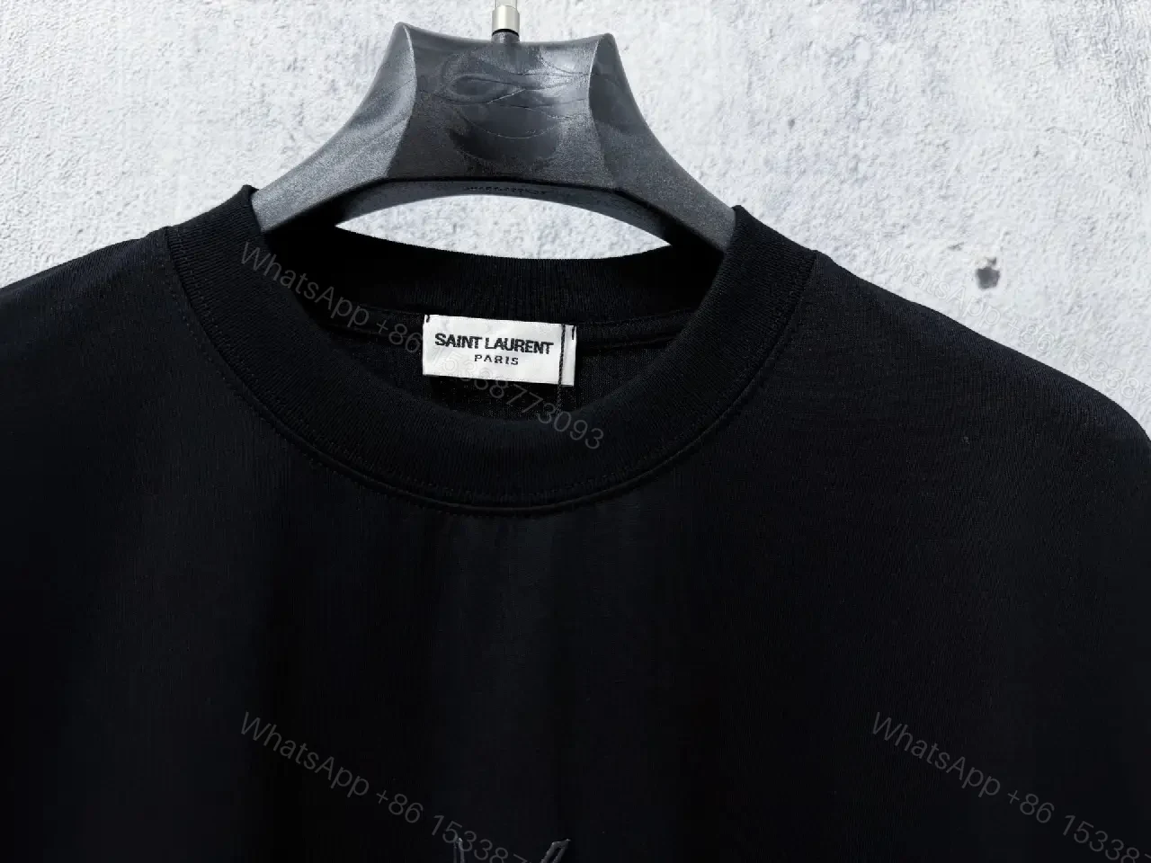 View 8 of Black Knit Tee, Subtle Logo, Oversized Comfort + Luxury Finish