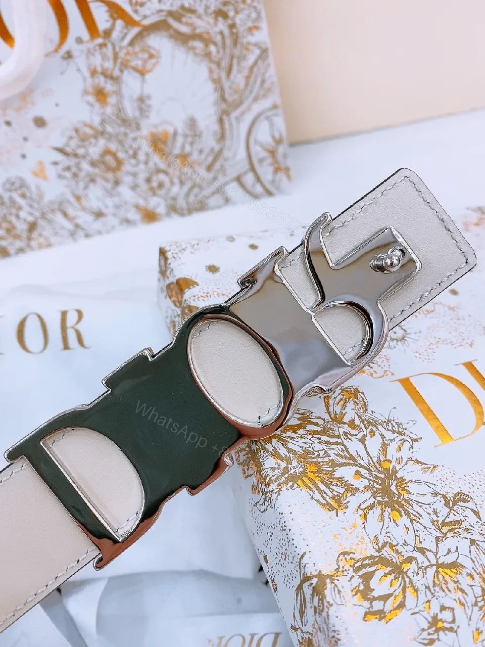 View 3 of Chic Black Leather Belt with Logo Buckle—Statement Accessory