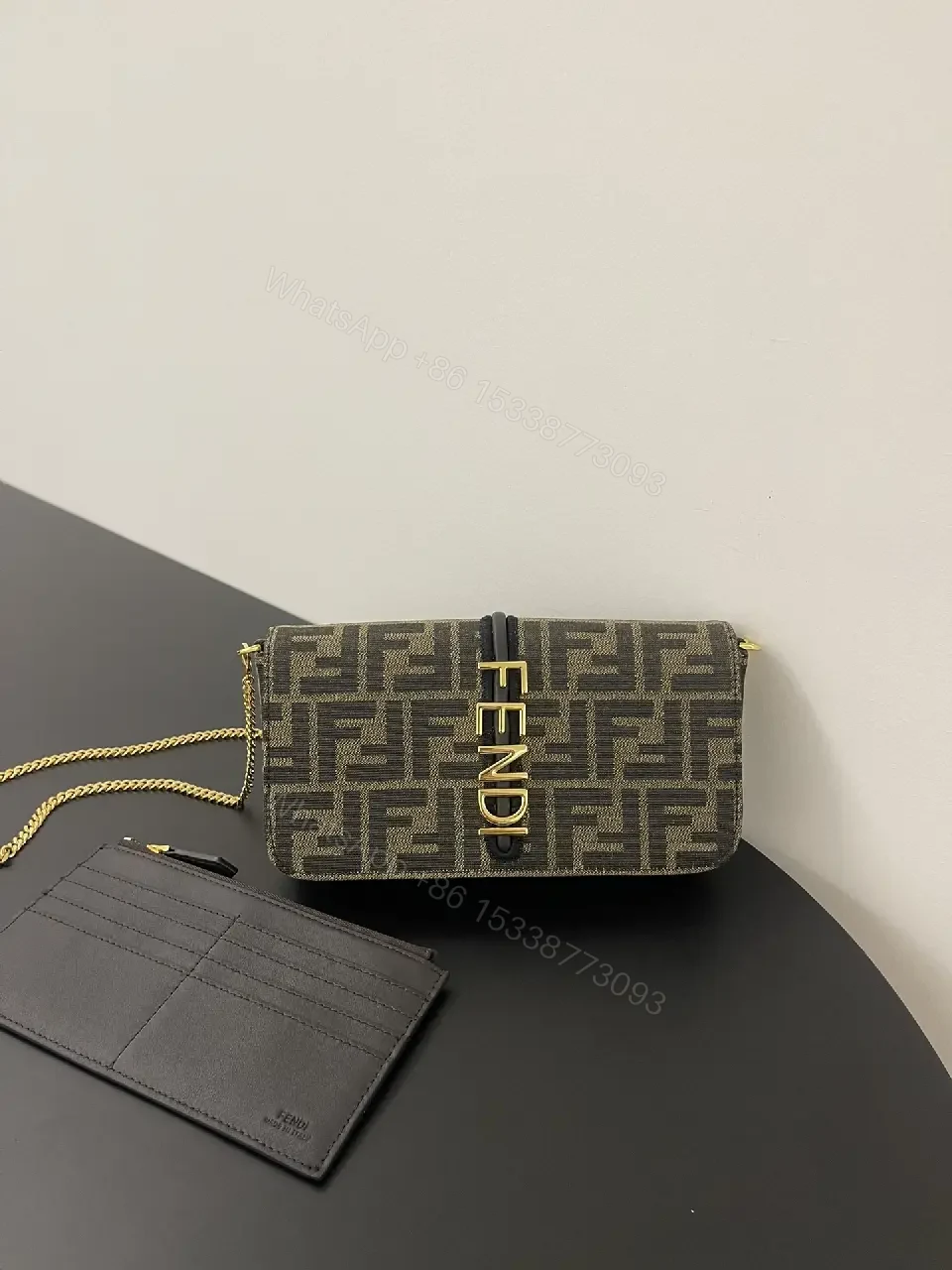 View 10 of Gray Coated Fabric Rectangular Shoulder Bag Bold Vertical Logo Clasp Product Type