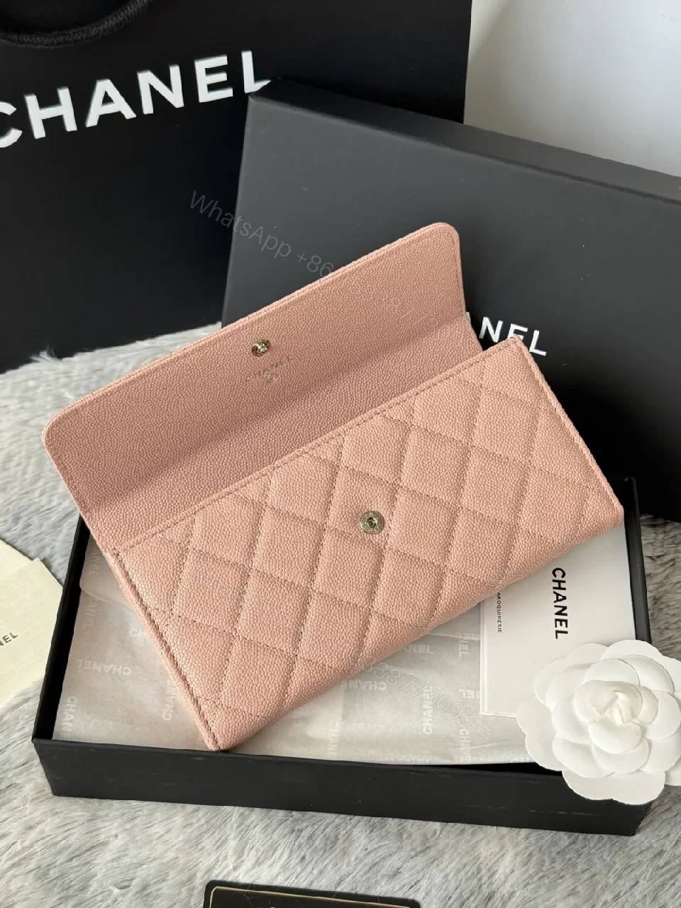 View 9 of Soft Pink Quilted Wallet with Silver Emblem - Compact Luxury Wallet