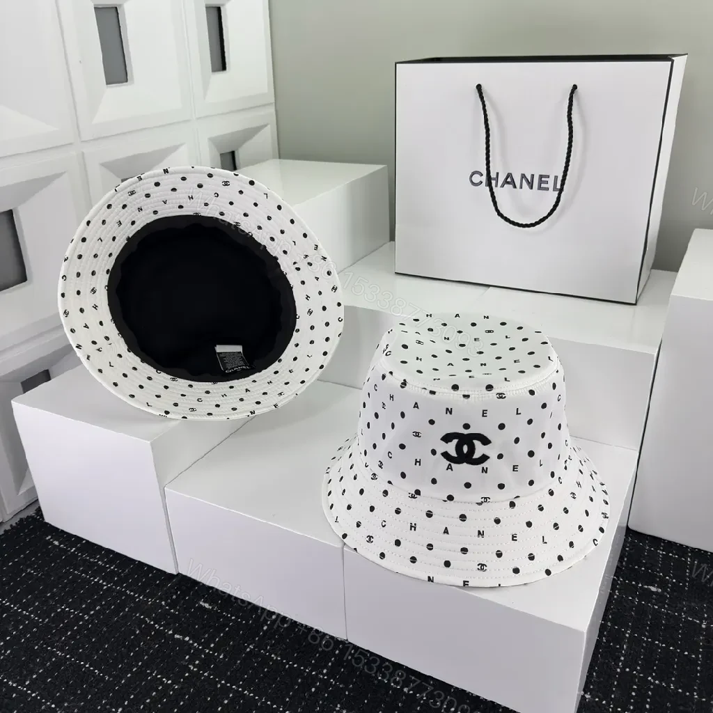 View 4 of Monochrome Dot Logo Bucket Hat - Premium Streetwear Style