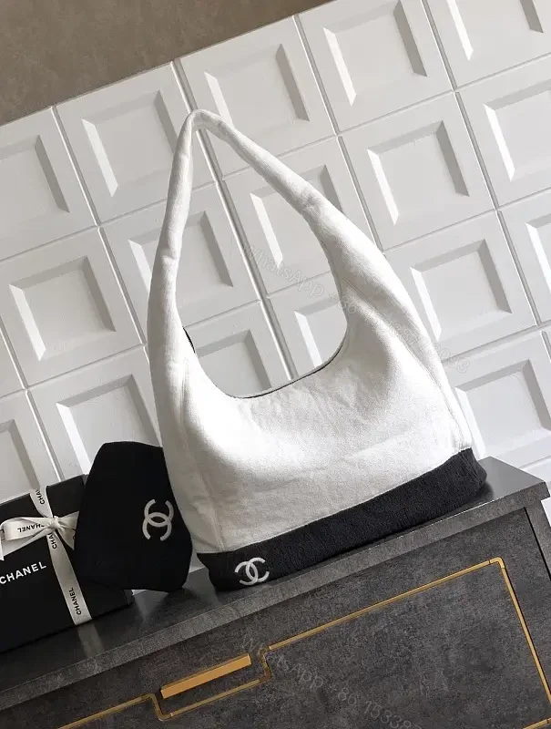 Two-Tone Knit Slouchy Hobo Bag with Chanel-Inspired Logo — view 1