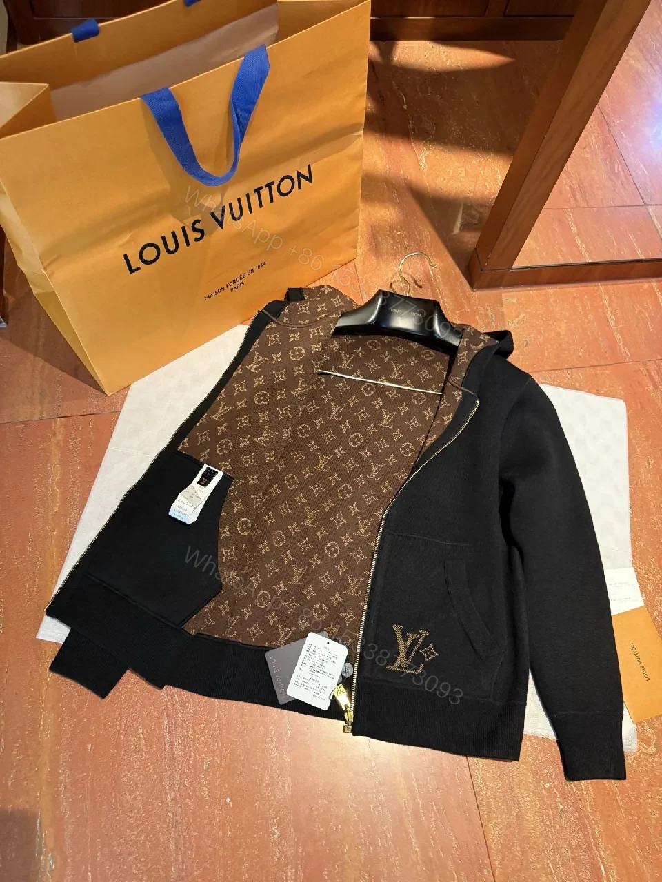View 3 of Black Zip Hoodie: Monogram Detail, Premium Cotton Blend, Versatile Luxury