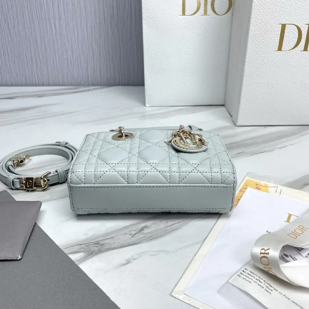 View 4 of Soft-Texture Quilted Mini Bag with Gold Charms, Calfskin, Elegant Chic, Luxury Carryall