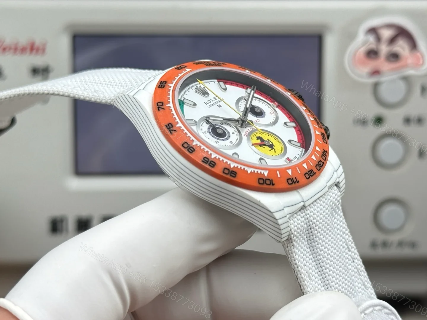 View 6 of Rolex Daytona Carbon Fiber White Replica 40MM Exclusive Orange Bezel White Fabric Strap R74 RG-ROLEX-DAYTONA-WHITE-DIAL