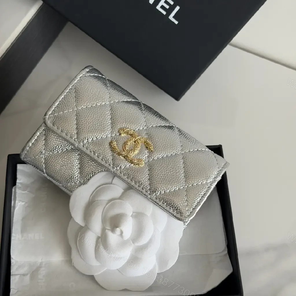 View 7 of Metallic Silver Leather Quilted Flap Wallet, Compact Bi-fold with Gold CC Logo